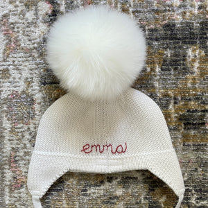 monogram [hand-stitched, back of hat]